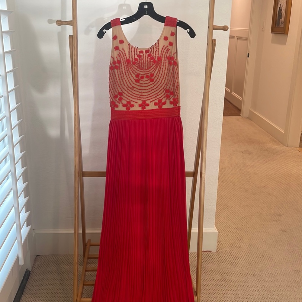 Anthropologie. Size 2. Red pleated maxi dress with beautiful embroidery